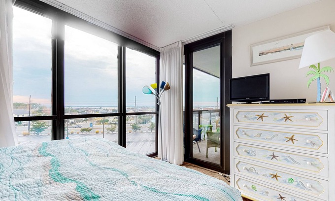 North Ocean City Condo | Sunny beach condo with balcony, W/D, pools, gym, sauna & AC