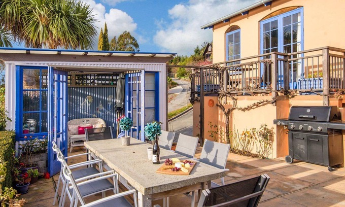 Kelvin Heights House | Sunny Lakeview Villa | Outdoor living | Hot Tub