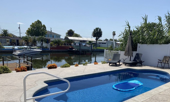 Sea Ranch On The Gulf House | Sunny Waterfront Oasis! Private Pool, Hot Tub & Dock!