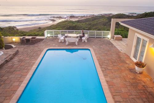 Umzumbe House | Sunrise on Stiebel Rocks