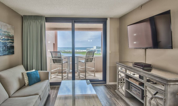 Holiday Isle Condo | SUNSET JETTY VIEW! ENJOY 1 FREE BEACH CHAIR SET UP & UMBRELLA EACH DAY