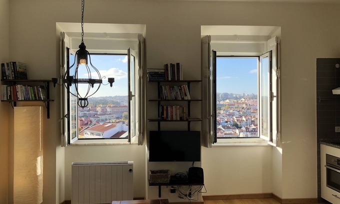 Alfama Apartment | Sunset over the roofs of Lisbon