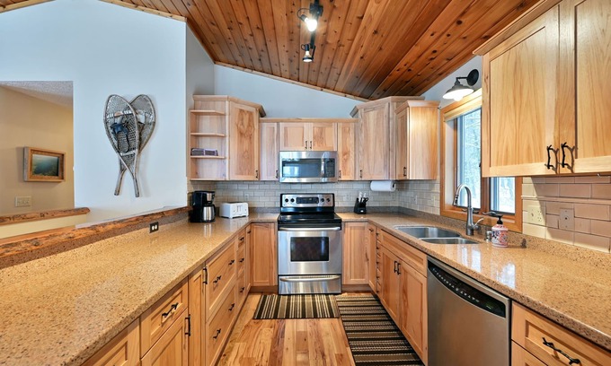 Northwoods Beach House | Sunset Pines- beautiful home with Northwesterly views of Grindstone Lake!
