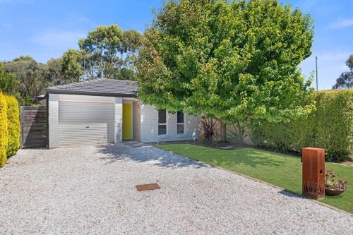 McCracken House | Sunshine Home with a Yellow Door