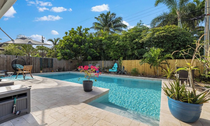 Middle River Terrace House | Sunshine Paradise! 3-bedroom heated pool home in East Fort Lauderdale.