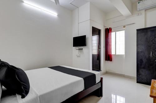 HBR Layout Hotel | Super Hotel O Sri Sai Guru Comfort