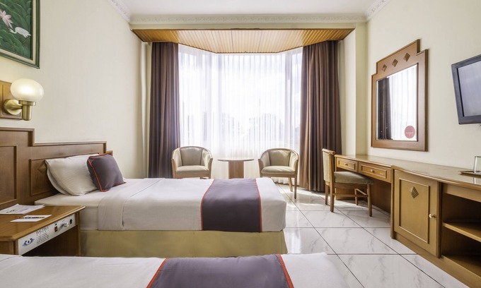 Malabar Hotel | Super OYO Collection O 25 Hotel Baltika