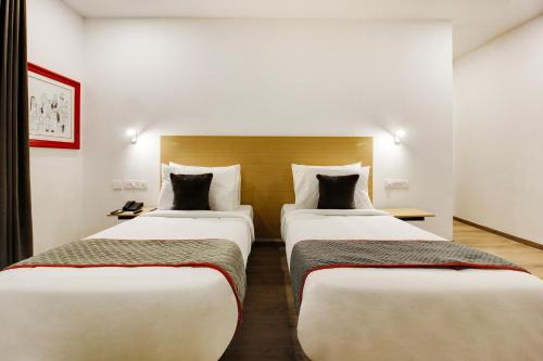 Begumpet Hotel | Super townhouse moosapet Rcc Prime
