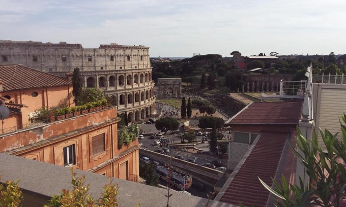 Monti Apartment | SUPERATTICO SUL COLOSSEO