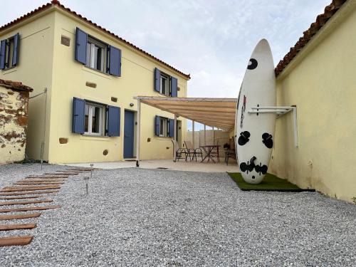 Lemnos House | Surf-themed stone house at Kalliopi 2