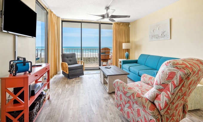 Windy Hill Condo | Sweeping sands & awesome views at oceanfront condo w/beachfront pool, expansive balcony
