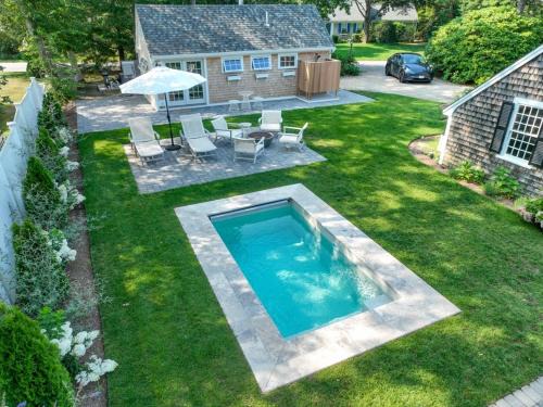 Osterville House | Swing Set Plunge pool and large yard await