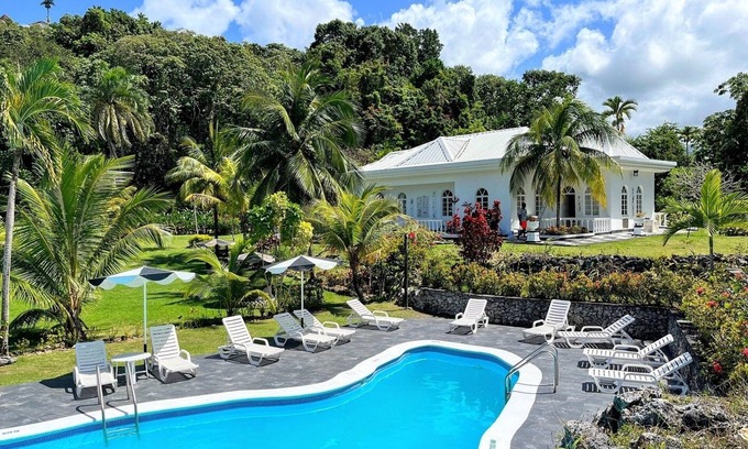 Port Antonio Apartment | Take a boat ride or swim in the beautiful Somerset Falls! FREE Parking & BFast!