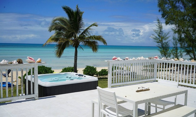 Tarpum Bay Villa | Tarpum Bay, Bahamas -NEW Luxury beachfront villa with private hot tub and beach