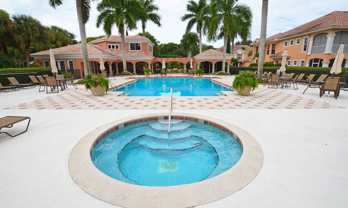 Pelican Bay House | Tastefully furnished ground floor unit in Pelican Bay community