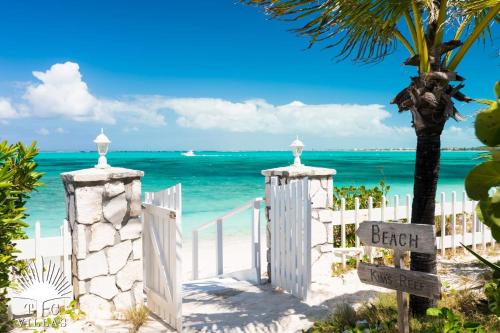 Providenciales Villa | TC Villas -Reef Beach House -Picture Perfect Grace Bay Beach