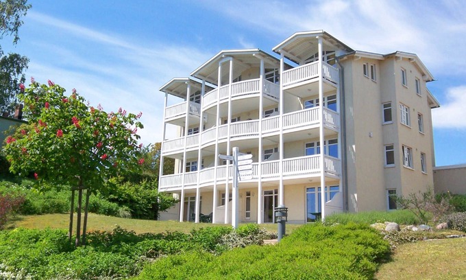 Gohren Apartment | Terrace, free use of the AHOI adventure pool and sauna - Sea view apartment 12