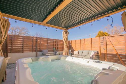 South Broadway Apartment | Terracotta Suite at ArnoTriplex! Hot Tub and Pet Friendly!
