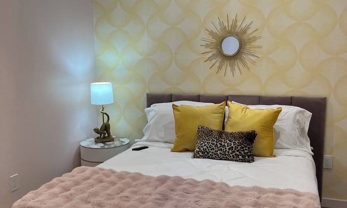 Williams Bay Apartment | The American Hotel suite 2, downtown Williams Bay. Walk to restaurants and lake.