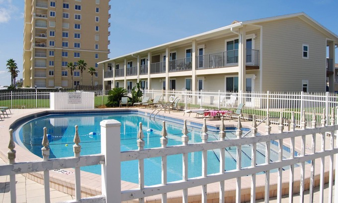 Jacksonville Beach Condo | The Beach Den, Oceanfront poolside studio with kitchen and reserved parking