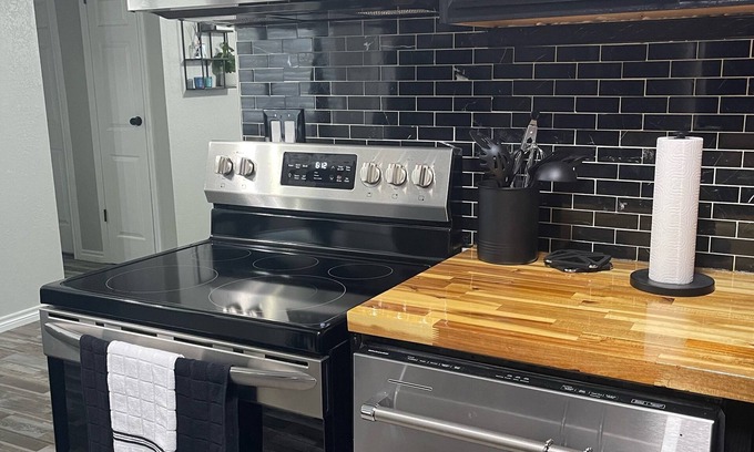 Lawton Condo | The Black House : Modern-Chic Hideaway by Ft. Sill, Shopping & Mountains