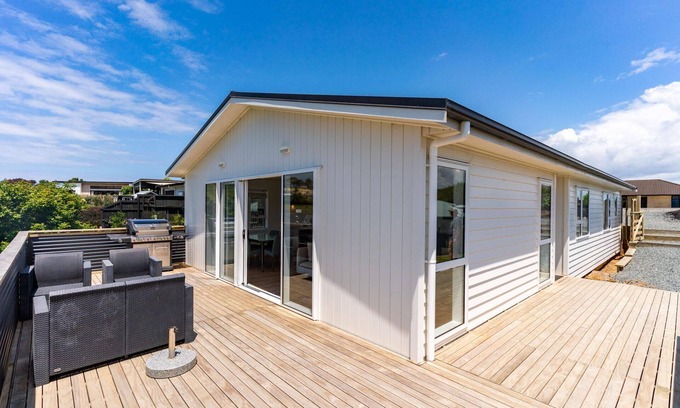 Mangawhai Heads House | The Castle - Modern, sunny, fully fenced holiday home with a lovely rural outlook