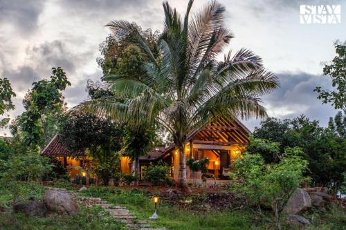 Doddaballapur Villa | The Clay Courtyard by VEO - Part of StayVista