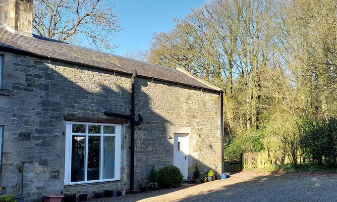 Canonbie Cottage | THE COACH HOUSE, CANONBIE, pet friendly, with a garden in Langholm
