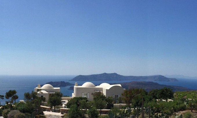 Santorini Villa | The Dome House: stunning sea views, garden, pond and squash court