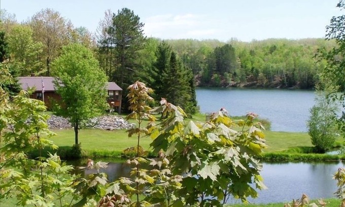 Upper Peninsula Michigan House | The Good Old Summertime - blue skies, green grass, and lovely water. Come enjoy!