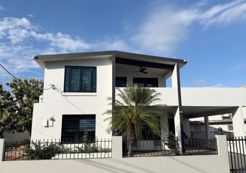 Corrales House | The Hibiscus House - King Suite, Terrace, and Pool