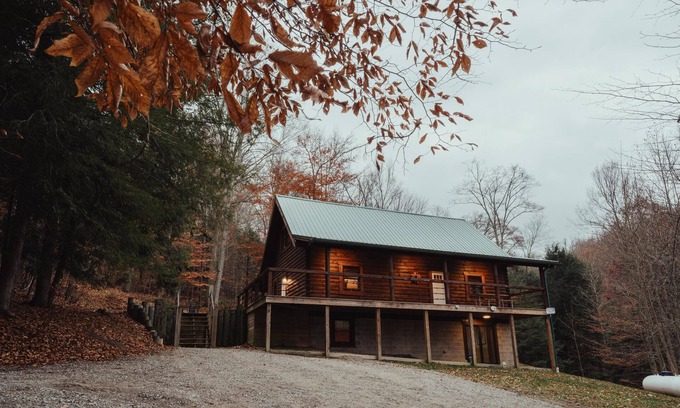 Rockbridge Cabin | The Hilltop - The Hilltop at Pine Creek Cabins and Camping in Hocking Hills, just minutes from Hocking Hills State Park. A cozy, yet spacious, pet-friendly cabin perfect for a reset surrounded by nature! Book your getaway today!