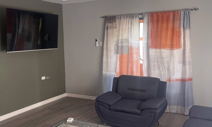 Arouca Apartment | The Home Stay:nCozy 2-bedroom apartment in fantastic La Resource Rd., D'Abadie.