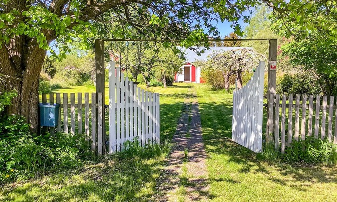 Balsta House | The house is last on the road with a few neighbors on one side and fields on the other.