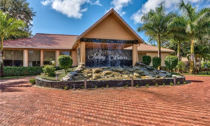 Naples Condo | The LARGEST Tropical Style Pool in S.W. Florida! GORGEOUS lake view!