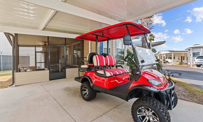 Upper Grand Lagoon House | The Little Love Bug: 2-pup friendly, golf cart, screened porch, near beach/pool