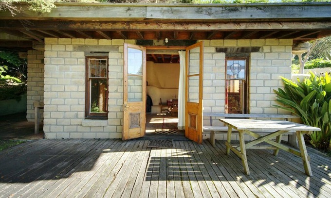 Pigeon Bay Apartment | The Mud House— earth studio in Pigeon Bay with views, wood-fired sauna & bath!
