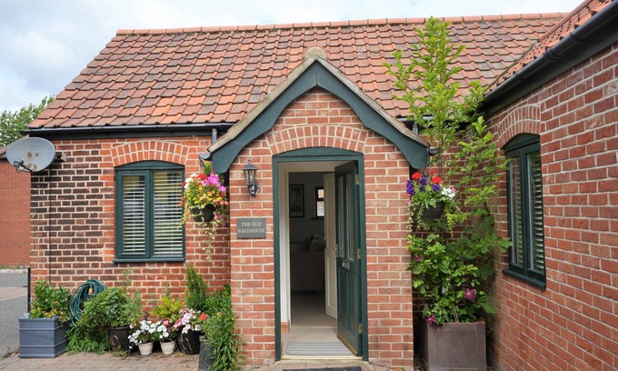 Sheringham House | The Old Bake House - beautifully presented, ground-floor property just yards from the shops & cafes