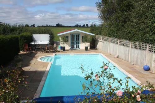 Newport House | The Owl House with swimming pool and private hot tub