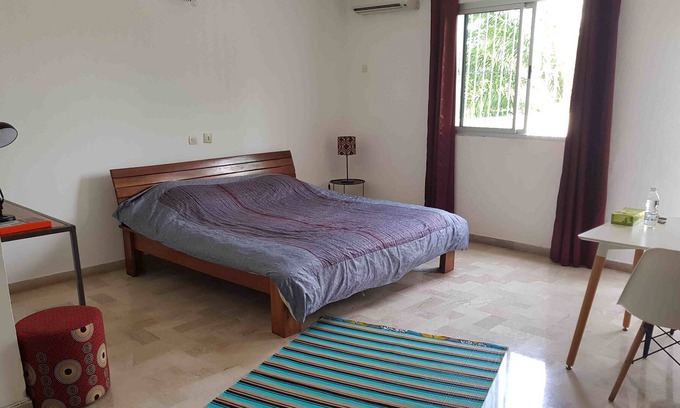 Angre House | The Smart House is a family home, in the heart of a lush garden,