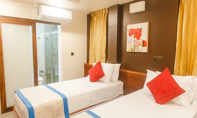 Hulhule House | the theme park! Family-sized condo with game room & deck