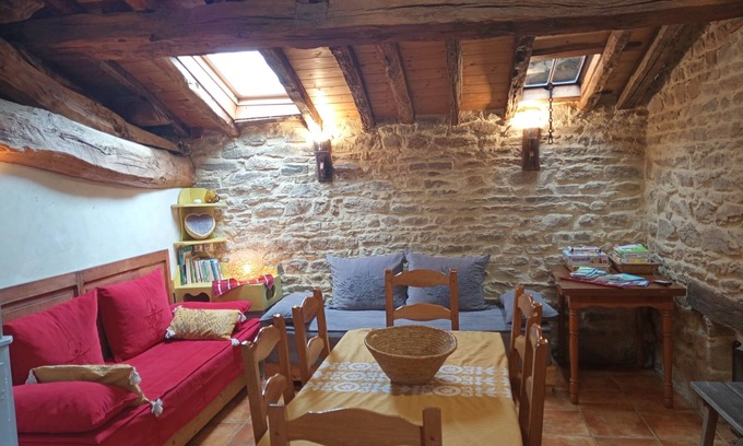 Yzeron Cottage | The yellow cottage, made of stone and wood