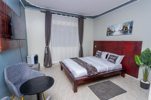 Soroti Apartment | Then Den Soroti White & Gray