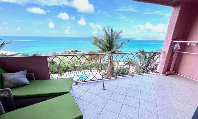 Cotton Valley Condo | This 2 BR, 2 BA condo w/ breathtaking panoramic views of the Caribbean.