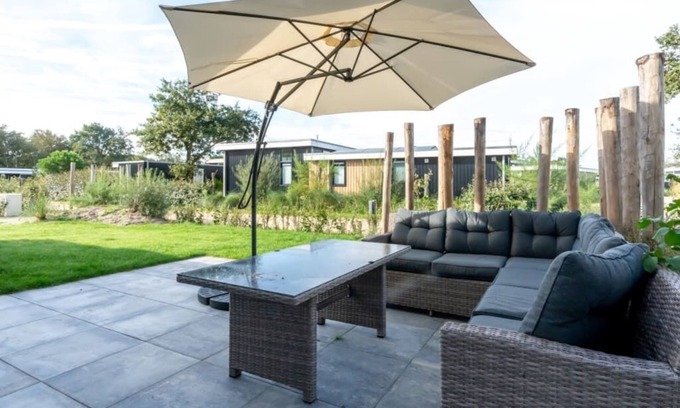 Burgh-Haamstede House | This 4-person chalet is fully equipped! It is wonderful to relax both inside on the comfortable corn