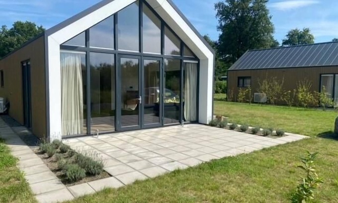 Gasselte House | This modern vacation home is the place to be. The house is suitable for four people, has two bedrooms and is completely on one level. Around the house is a spacious garden to relax in the sun.