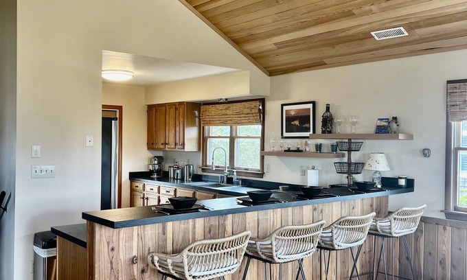 Ocracoke House | Three-bedroom house with views, decks, golf cart and home gym!
