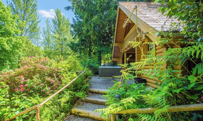 Westleigh Ski Chalet | Timber lodge set in an elevated position with views of the lake.
