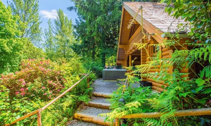Westleigh Ski Chalet | Timber lodge set in an elevated position with views of the lake.