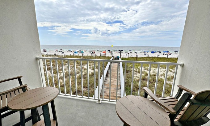 Gulf Shores Condo | Time to get… 🎶 Knee deep in the water somewhere! 🎶 on island time!